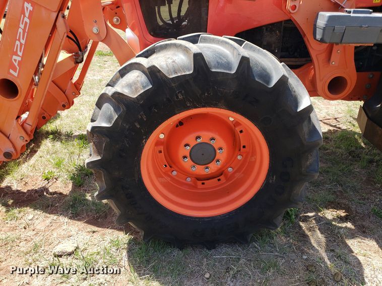 image for item DQ0557 Kubota M135GX  MFWD tractor