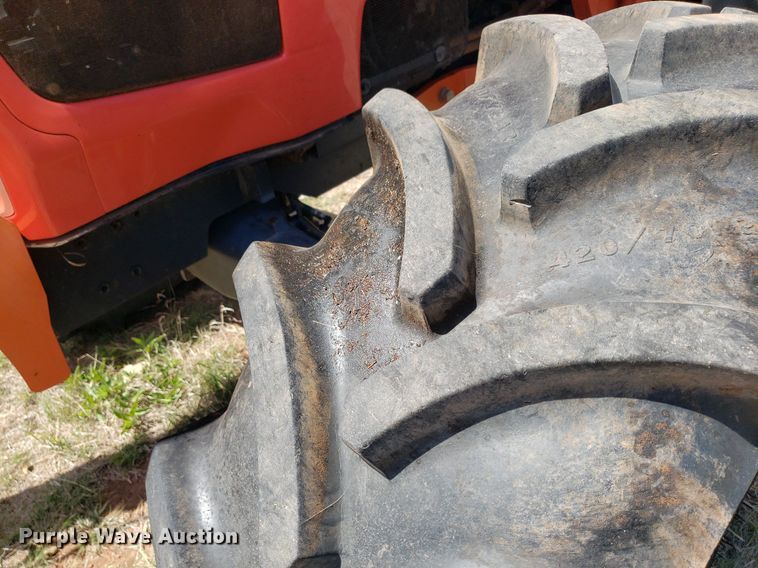 image for item DQ0557 Kubota M135GX  MFWD tractor