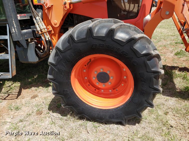 image for item DQ0557 Kubota M135GX  MFWD tractor