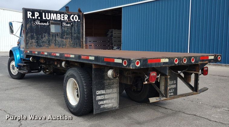 image for item DQ1715 1999 International 4700  dump flatbed truck