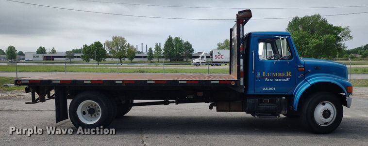 image for item DQ1715 1999 International 4700  dump flatbed truck
