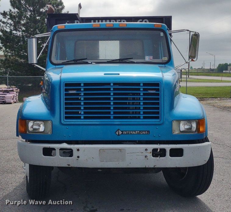 image for item DQ1715 1999 International 4700  dump flatbed truck