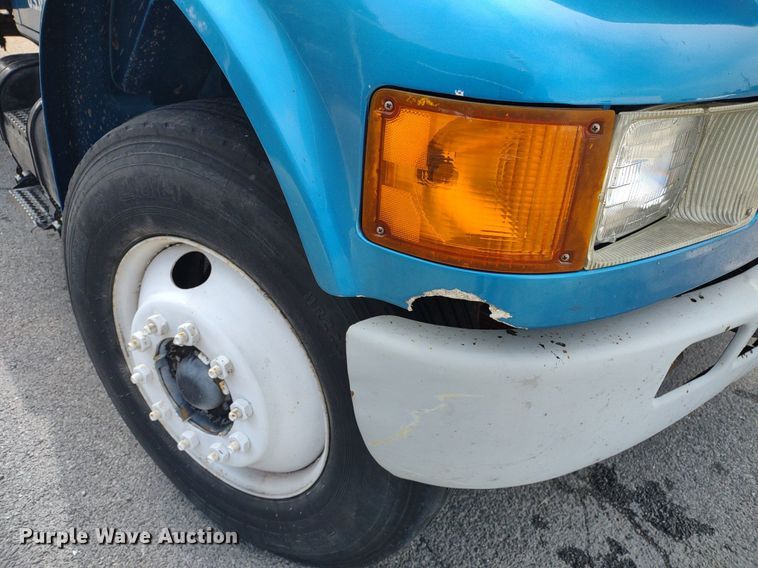 image for item DQ1715 1999 International 4700  dump flatbed truck