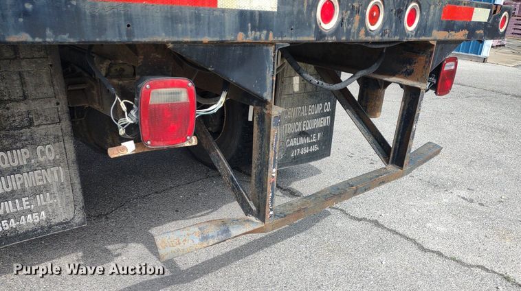 image for item DQ1715 1999 International 4700  dump flatbed truck