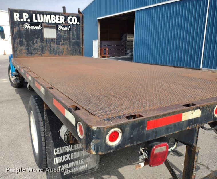 image for item DQ1715 1999 International 4700  dump flatbed truck