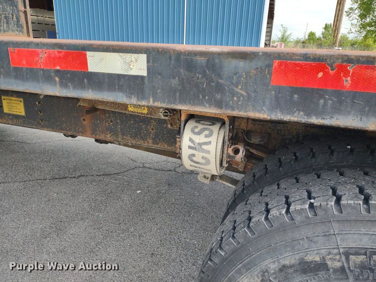 image for item DQ1715 1999 International 4700  dump flatbed truck