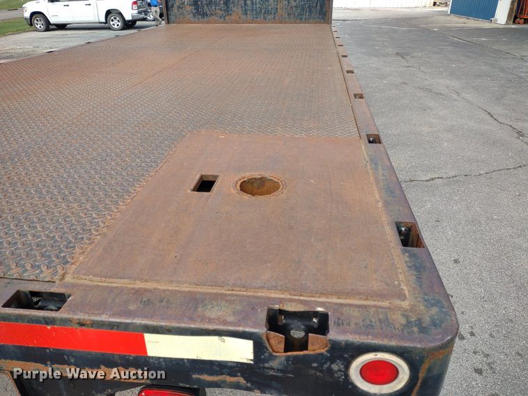 image for item DQ1715 1999 International 4700  dump flatbed truck