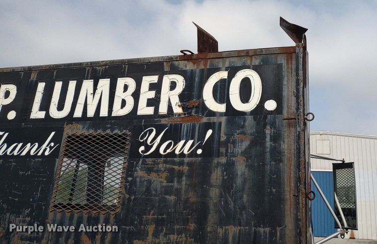 image for item DQ1715 1999 International 4700  dump flatbed truck