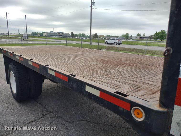 image for item DQ1715 1999 International 4700  dump flatbed truck