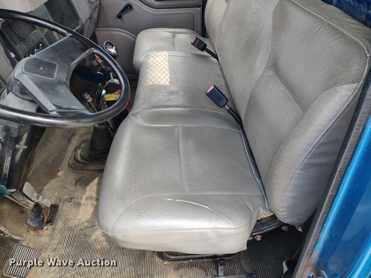 image for item DQ1715 1999 International 4700  dump flatbed truck