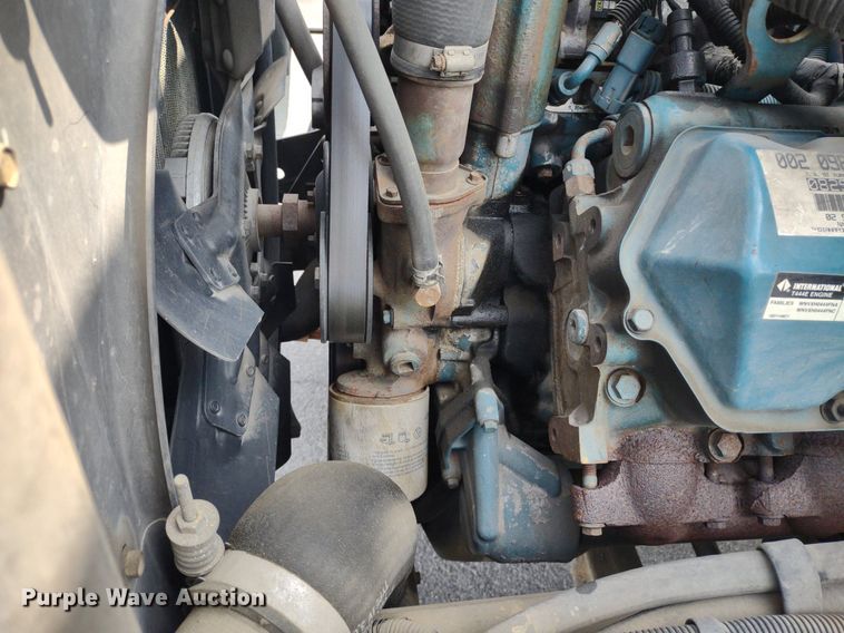 image for item DQ1715 1999 International 4700  dump flatbed truck