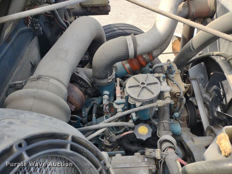 image for item DQ1715 1999 International 4700  dump flatbed truck