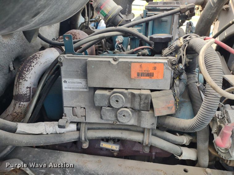 image for item DQ1715 1999 International 4700  dump flatbed truck