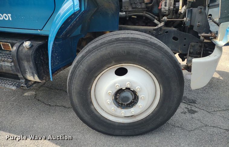 image for item DQ1715 1999 International 4700  dump flatbed truck