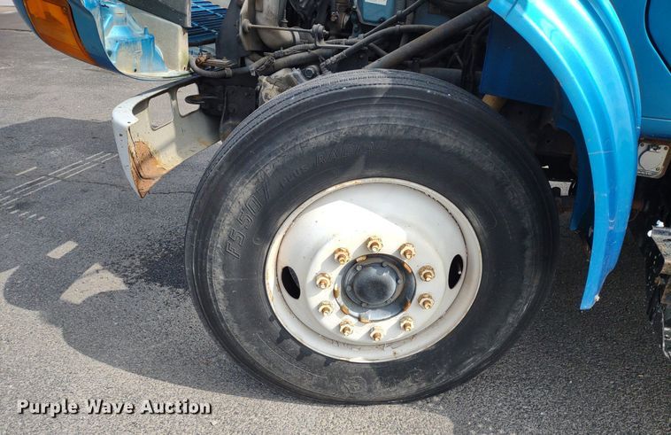 image for item DQ1715 1999 International 4700  dump flatbed truck