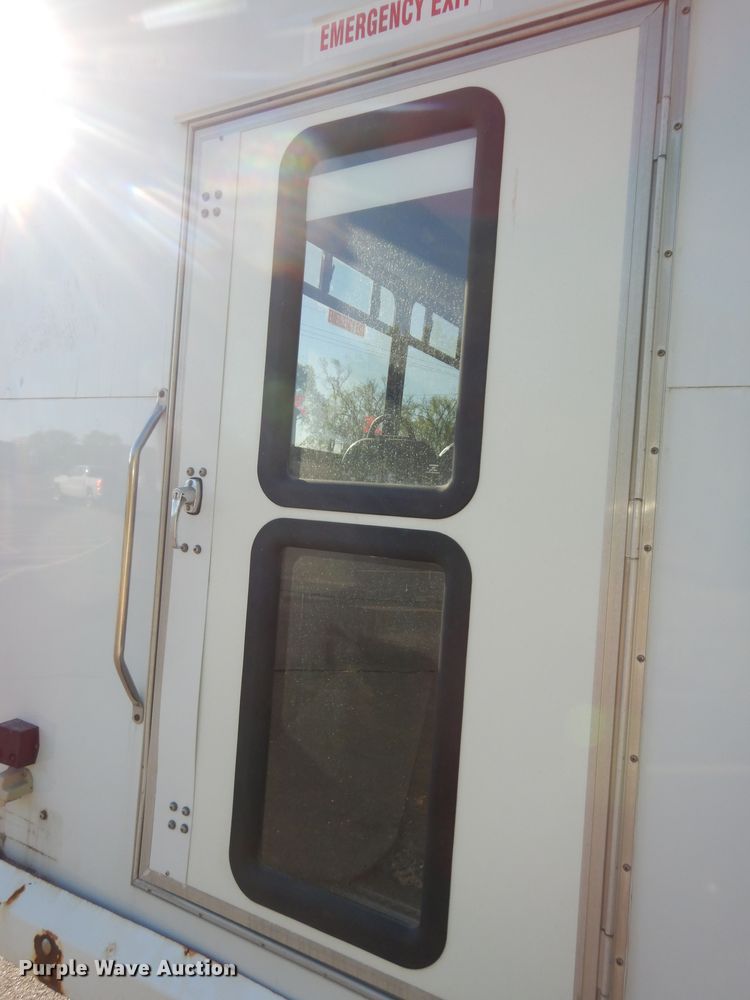 image for item DK1797 2015 Ford E450 Super Duty  shuttle bus