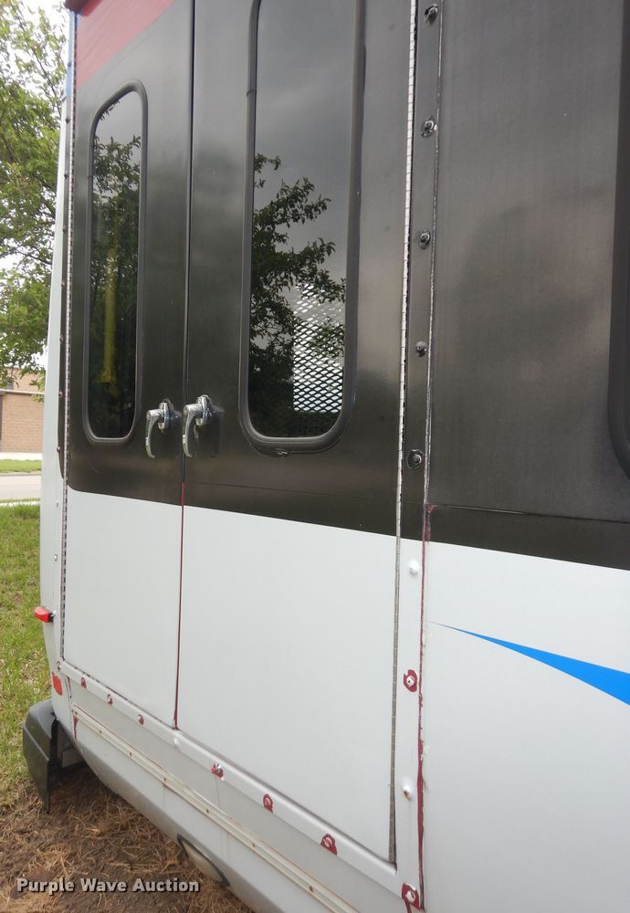 image for item IB9859 2011 Ford Econoline E450 Super Duty  shuttle bus