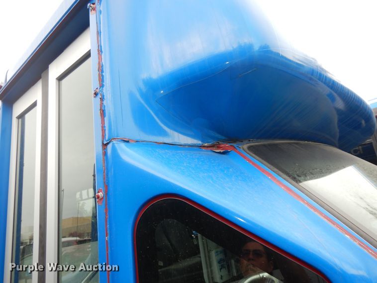 image for item IB9860 2012 Ford Econoline E450 Super Duty  shuttle bus