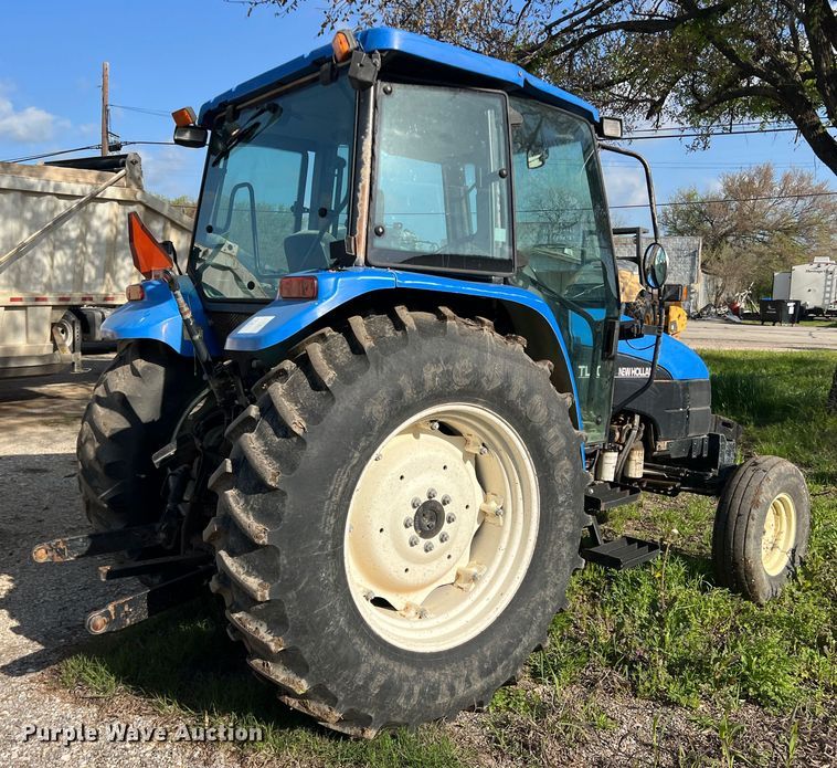 image for item MQ9873 2002 New Holland TL100  tractor