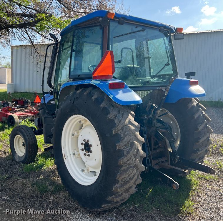 image for item MQ9873 2002 New Holland TL100  tractor