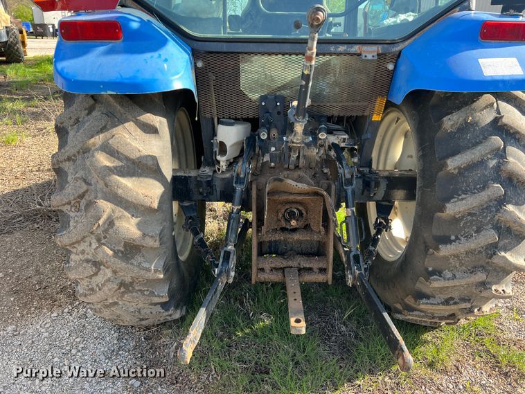 image for item MQ9873 2002 New Holland TL100  tractor