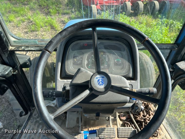 image for item MQ9873 2002 New Holland TL100  tractor