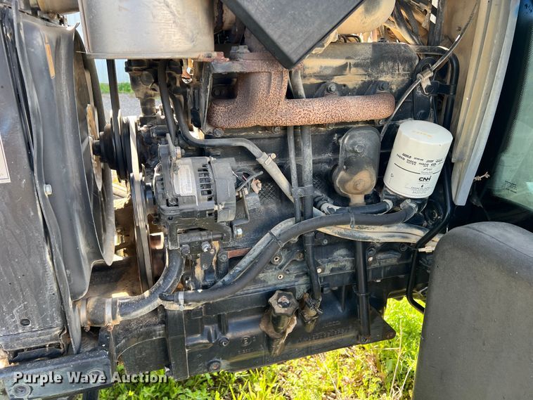 image for item MQ9873 2002 New Holland TL100  tractor