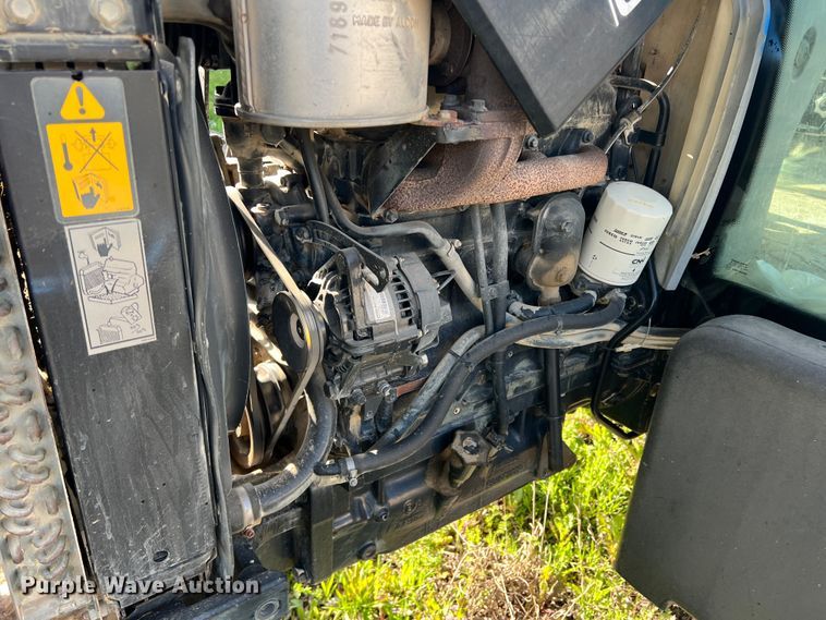 image for item MQ9873 2002 New Holland TL100  tractor