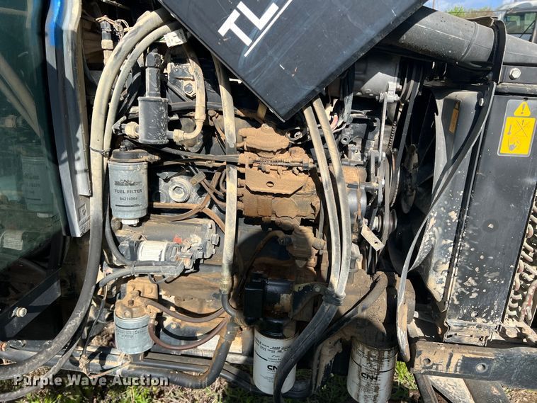 image for item MQ9873 2002 New Holland TL100  tractor