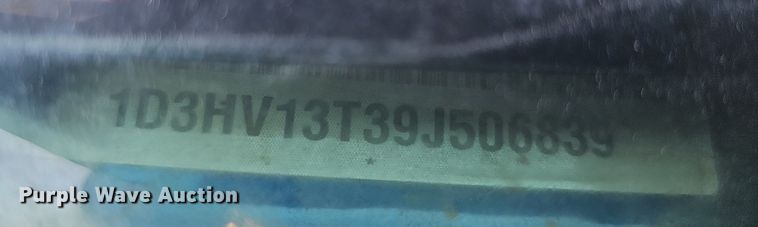 image for item DO4413 2009 Dodge Ram 1500  Crew Cab flatbed pickup truck