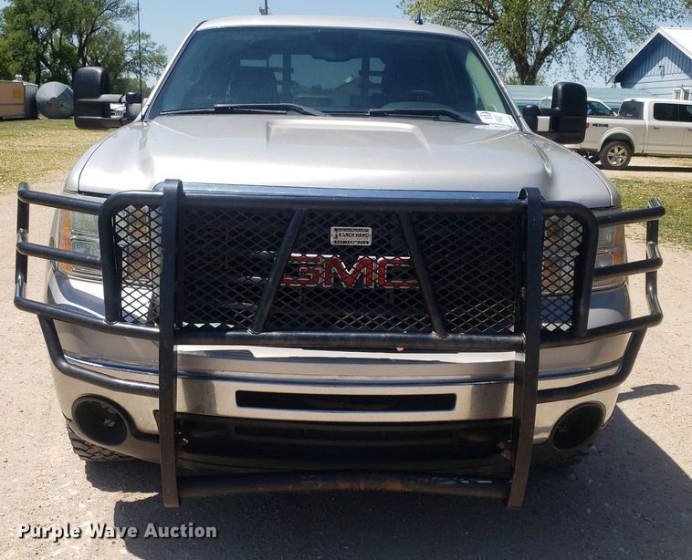 image for item DP7849 2009 GMC Sierra 2500HD  Crew Cab flatbed pickup truck