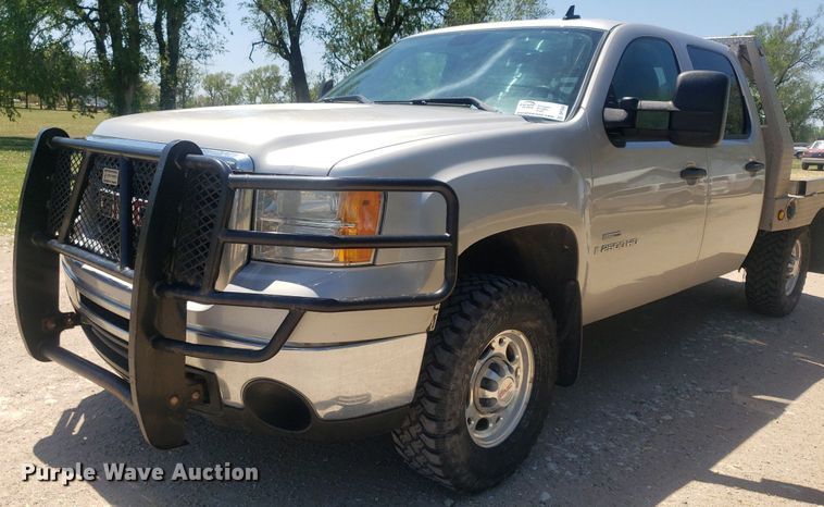 image for item DP7849 2009 GMC Sierra 2500HD  Crew Cab flatbed pickup truck