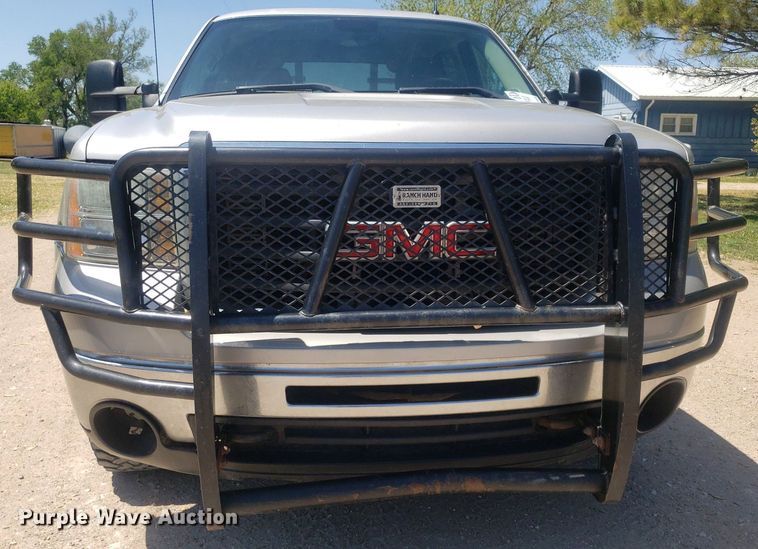 image for item DP7849 2009 GMC Sierra 2500HD  Crew Cab flatbed pickup truck