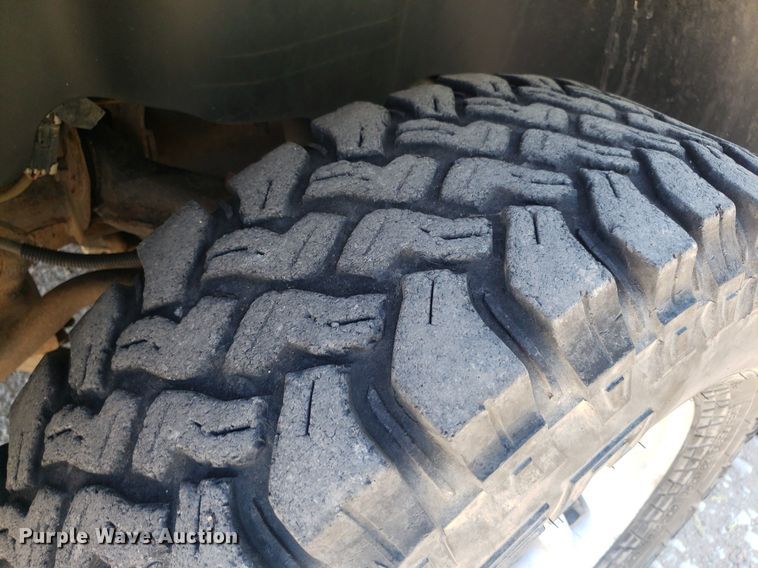 image for item DP7849 2009 GMC Sierra 2500HD  Crew Cab flatbed pickup truck