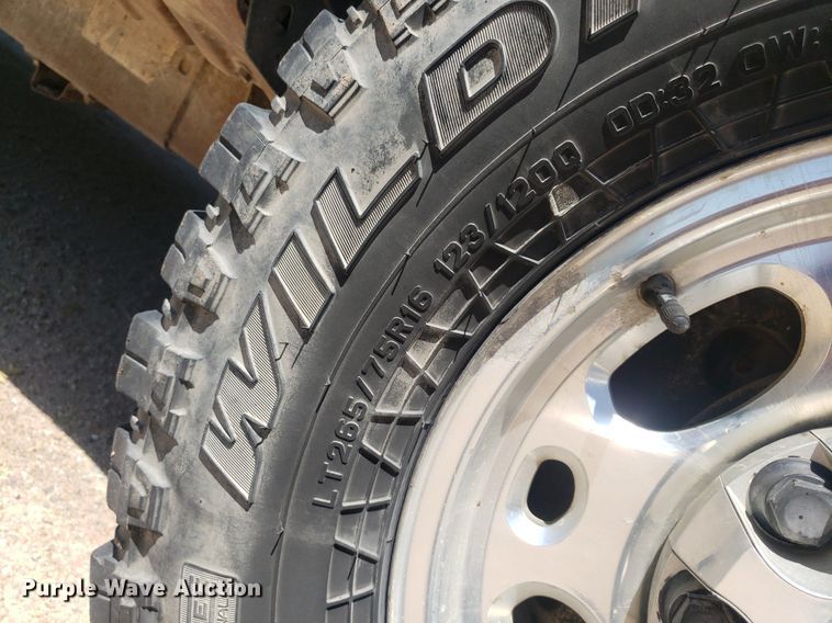 image for item DP7849 2009 GMC Sierra 2500HD  Crew Cab flatbed pickup truck