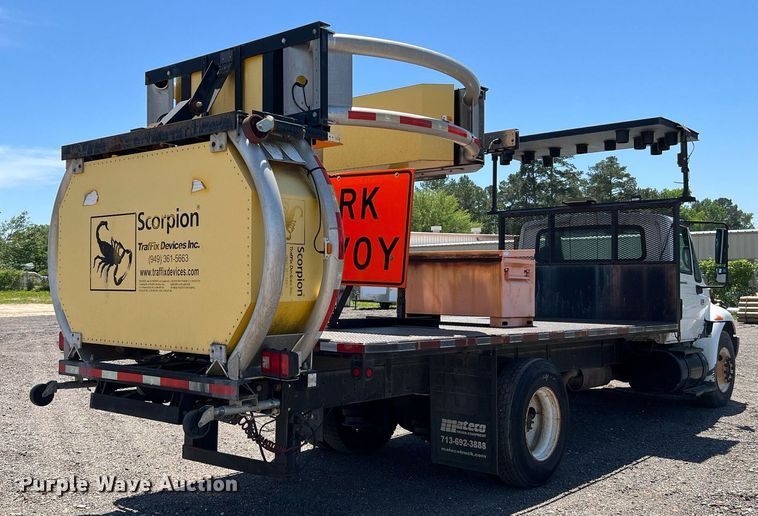 image for item DQ2045 2005 International 4300  flatbed truck with crash attenuator