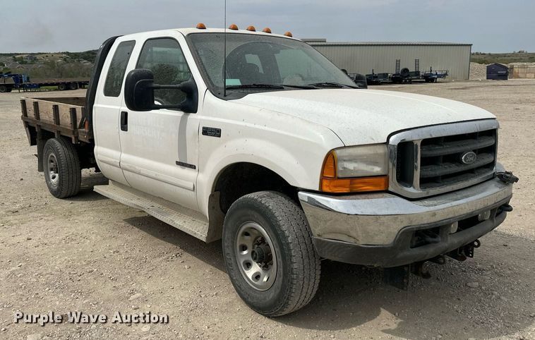 image for item LP9905 2001 Ford F250 Super Duty  SuperCab flatbed pickup truck