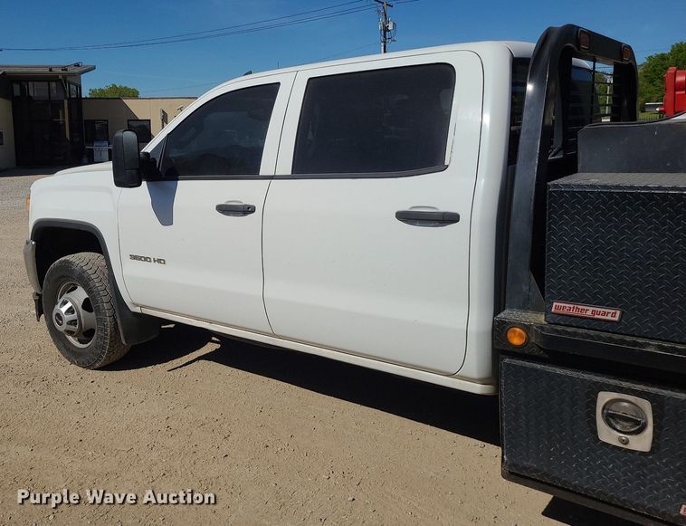 image for item MX9731 2015 GMC Sierra 3500HD  Crew Cab flatbed pickup truck