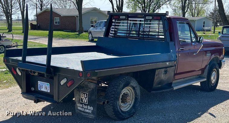 image for item MY9676 1989 Ford F250  bale bed pickup truck
