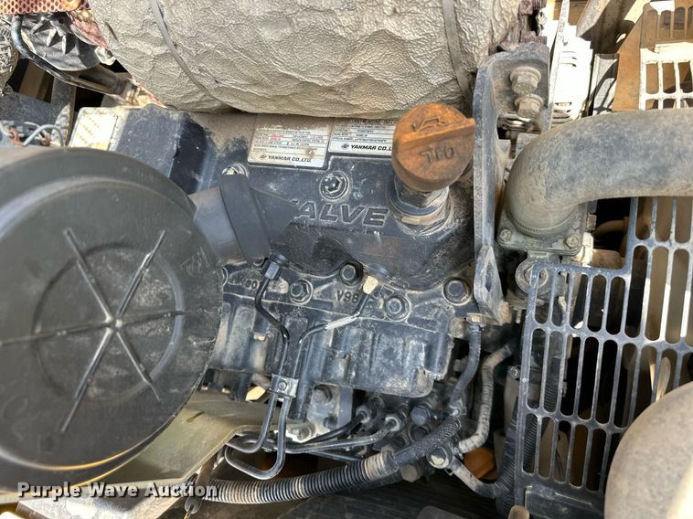 image for item DO4972 2004 Komatsu SK1020  skid steer loader