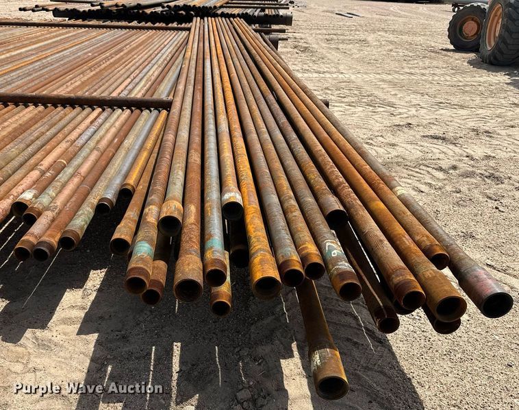 image for item JJ9930 Approximately 100 joints of 2 3/8" diameter pipe