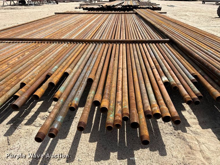 image for item JJ9930 Approximately 100 joints of 2 3/8" diameter pipe