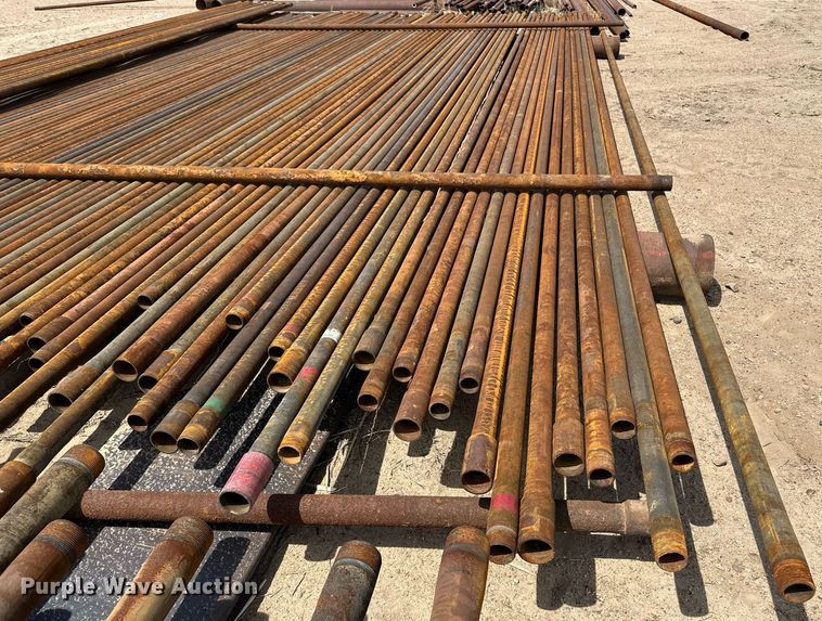 image for item JJ9930 Approximately 100 joints of 2 3/8" diameter pipe