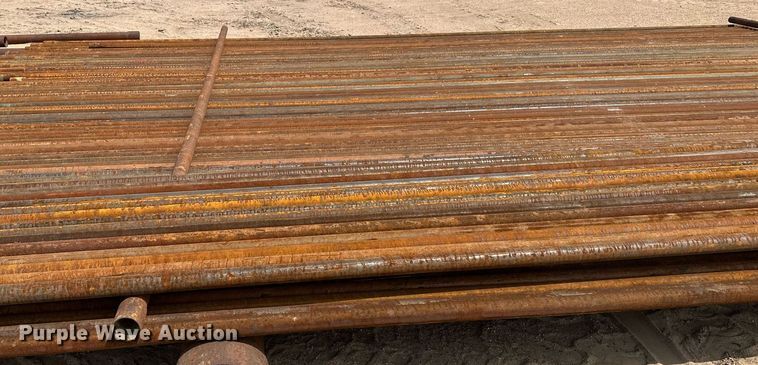 image for item JJ9930 Approximately 100 joints of 2 3/8" diameter pipe