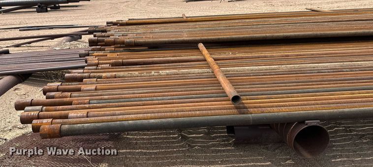 image for item JJ9931 Approximately 100 joints of 2 7/8" diameter pipe