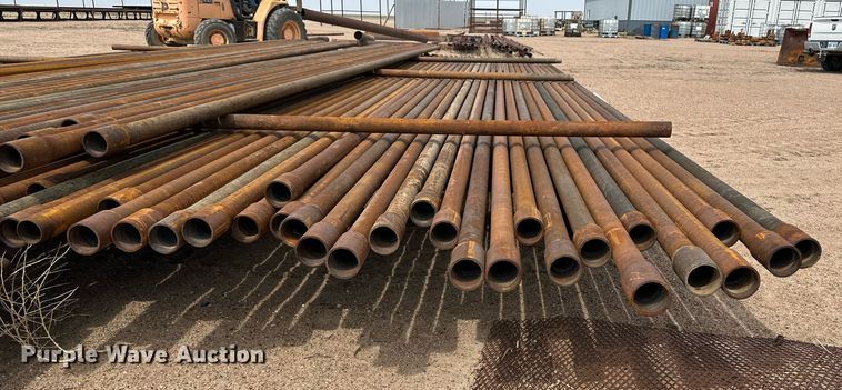 image for item JJ9931 Approximately 100 joints of 2 7/8" diameter pipe