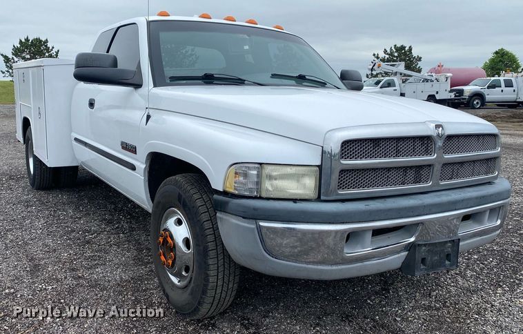 image for item KB9444 2001 Dodge Ram 3500  Quad Cab utility bed pickup truck