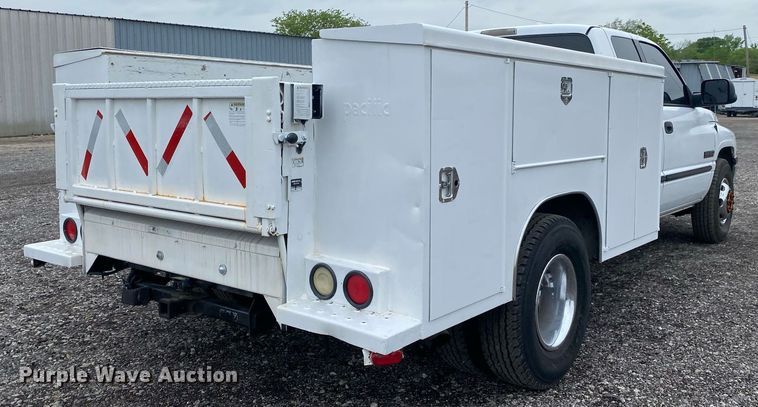 image for item KB9444 2001 Dodge Ram 3500  Quad Cab utility bed pickup truck