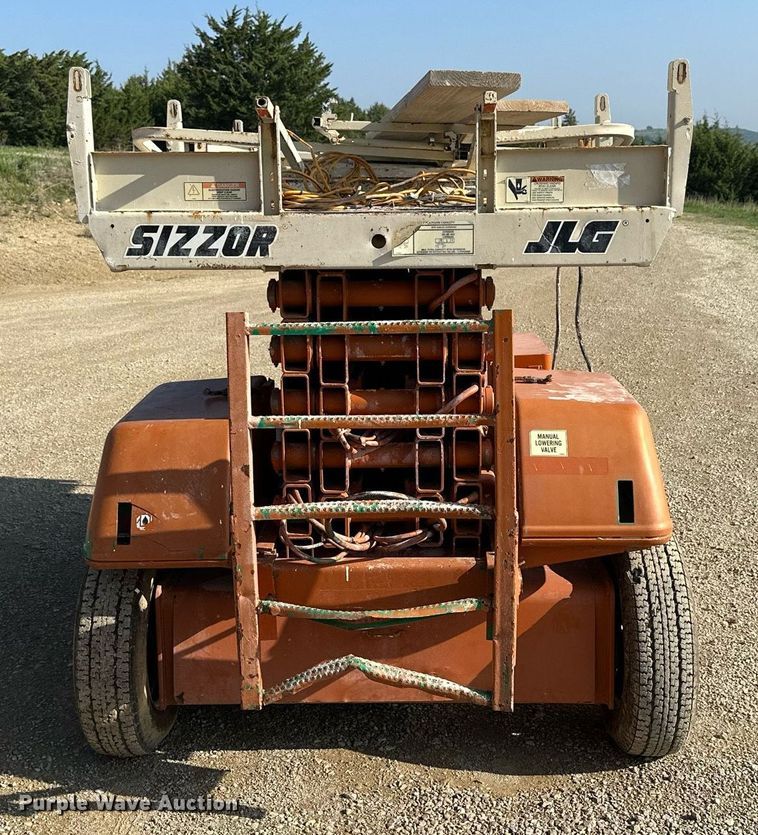 image for item KL9098 1998 JLG Sizzor 3969-E  scissor lift