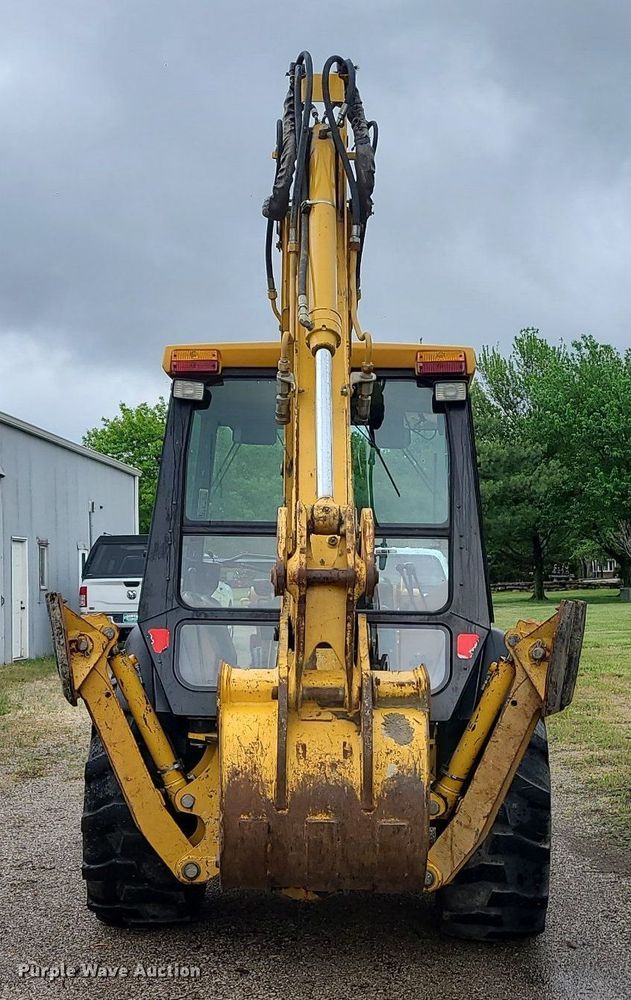 image for item LE9042 1999 John Deere 310E  backhoe